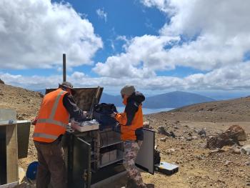 Technicians installing the MultiGas system near Te Maari  
