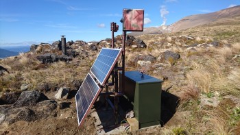 View of the Te Maari outstation showing the solar array, cabinet, web camera, telemetry antenna and GNSS pilar