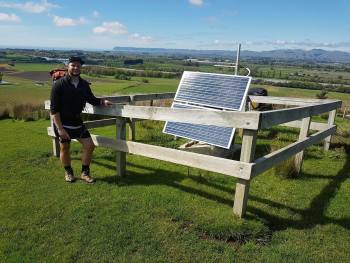 Comms boffin Ben taking a breather with the beautiful Wairau Valley in the background