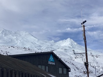The south-western DOAS scanner at Turoa ski field detects the SO2 plume from Ruapehu when the wind is blowing from the north-east quarter. The scanner is the black footlong tube at the top of pole.