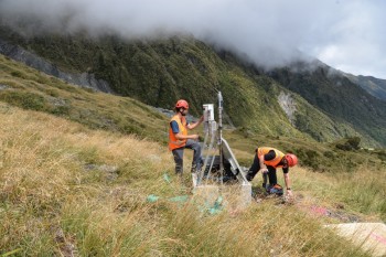 GeoNet technicians Ashton McGill and Jackson Shanks completing the assembly of the temporary monitoring station