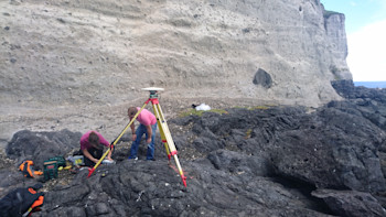 GeoNet techs surveying the GNSS mark located at Macauley Island.