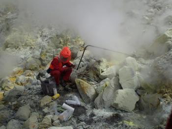 One of GeoNets gas chemists sampling the volcanic gas
