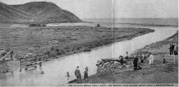 Remains of the Pouawa bridge, decking was later found about 800 metres upstream. Photo: Tairāwhiti Museum, Te Whare Taonga O Te Tairāwhiti 