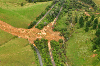 Figure 4: Photo of the large landslide over the Railway and Tahekeroa Road, North of Auckland.  Dougal Townsend, GNS Science 