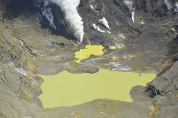 Aerial view of the Main Crater at Whakaari/White Island showing the active vent and crater lakes.  Taken Oct 2021