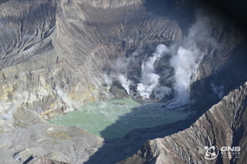 Aerial view of the crater lake and active vents at Whakaari/White Island, 18 July 2023. 