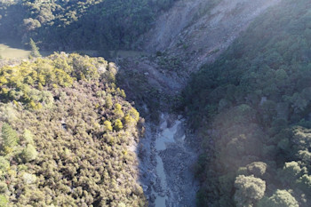 Landslide Dam showing lake building up behind it - Photo credit: Regine Morgenstern