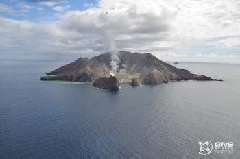 Figure 1: Aerial view of the island producing steam and gas emissions, 14 April 2023. Photo credit: BJ Scott.