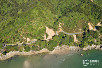 The coastal road from Wainui Bay to Tata Beach was impacted by several slips.