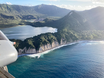 Figure 4. Coastal landslides and rockfalls near Ngaio Bluff, Blue Lake in the background 