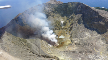 The main steam and gas plume is coming from the ash cone occupying the previous hot lake crater. The small lake to the north is the cool lake and the lava dome crater is partially hidden under the steam plume to the left of the cool lake.