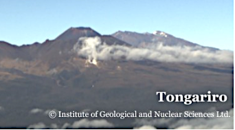 An image from one of our webcams showing the Ketetahi fumarole on Mt Tongariro on a cold and relatively still morning in April 2023. Steam and gases rise from the fumarole and are gently blown to the right of the image. Mt Ngauruhoe and Mt Ruapehu are in the background. The view is a crop of a full-size image to better shown the Ketetahi area.