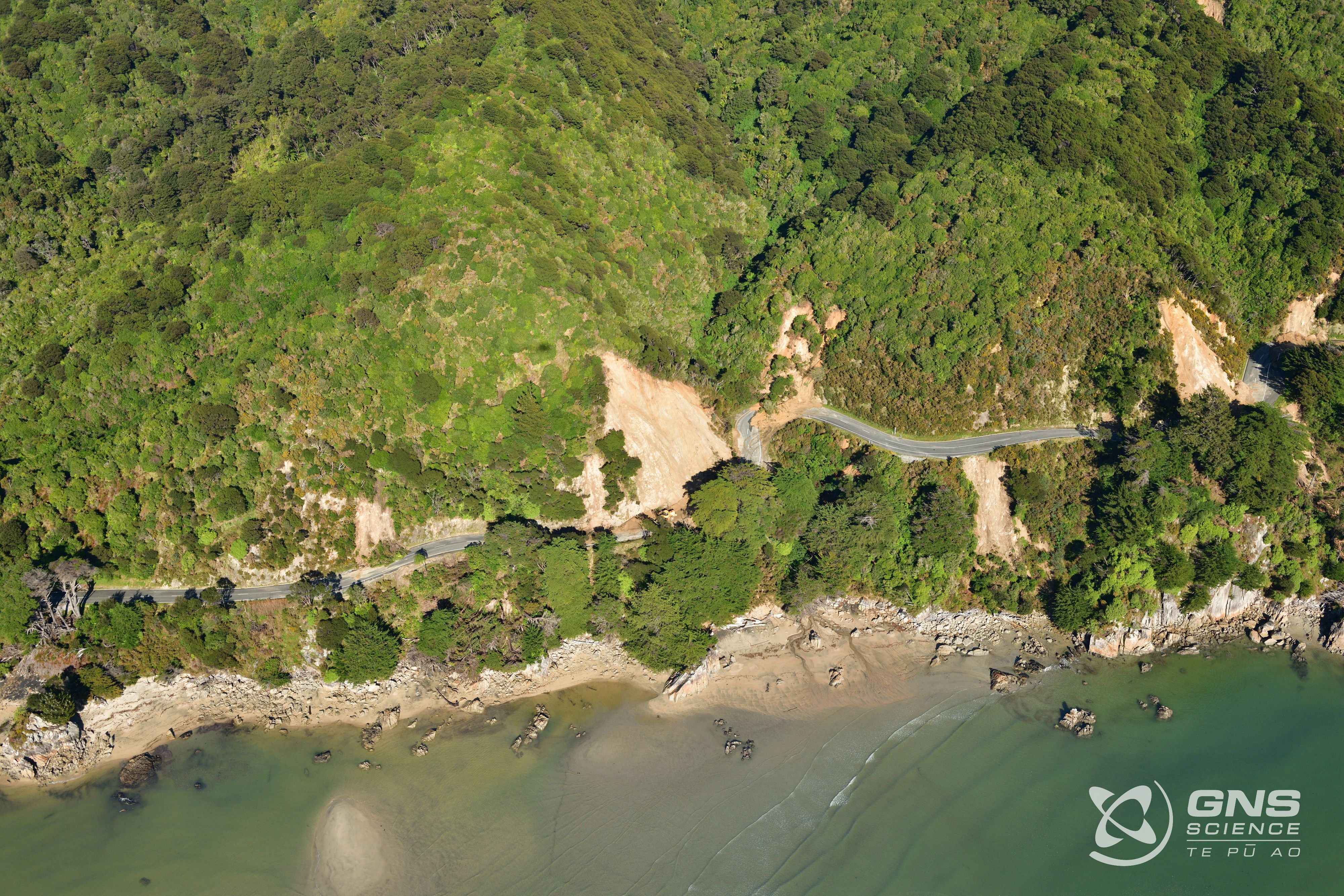 The coastal road from Wainui Bay to Tata Beach was impacted by several slips.